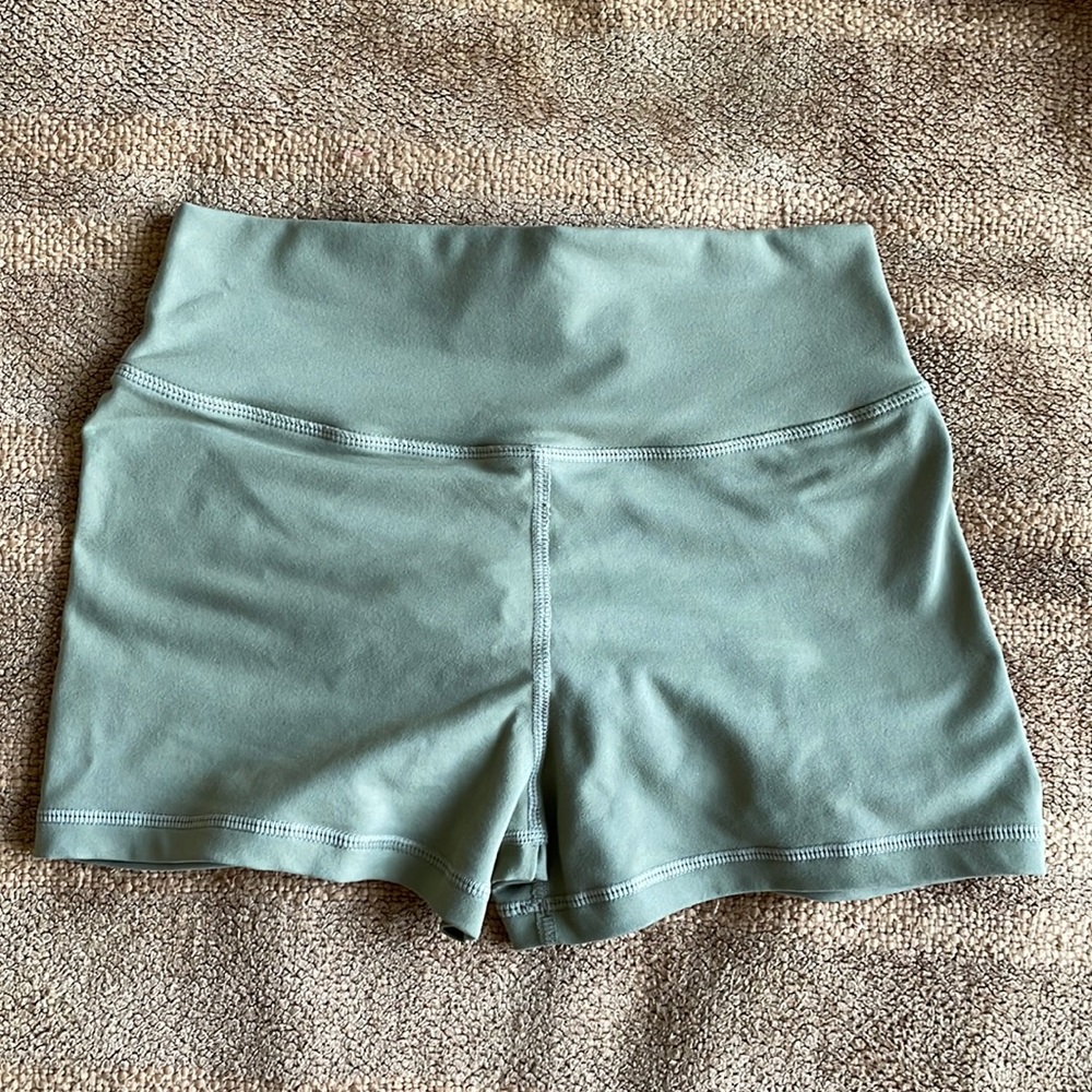 Muscle nation shorts. Never worn because they are the wrong size for me.
